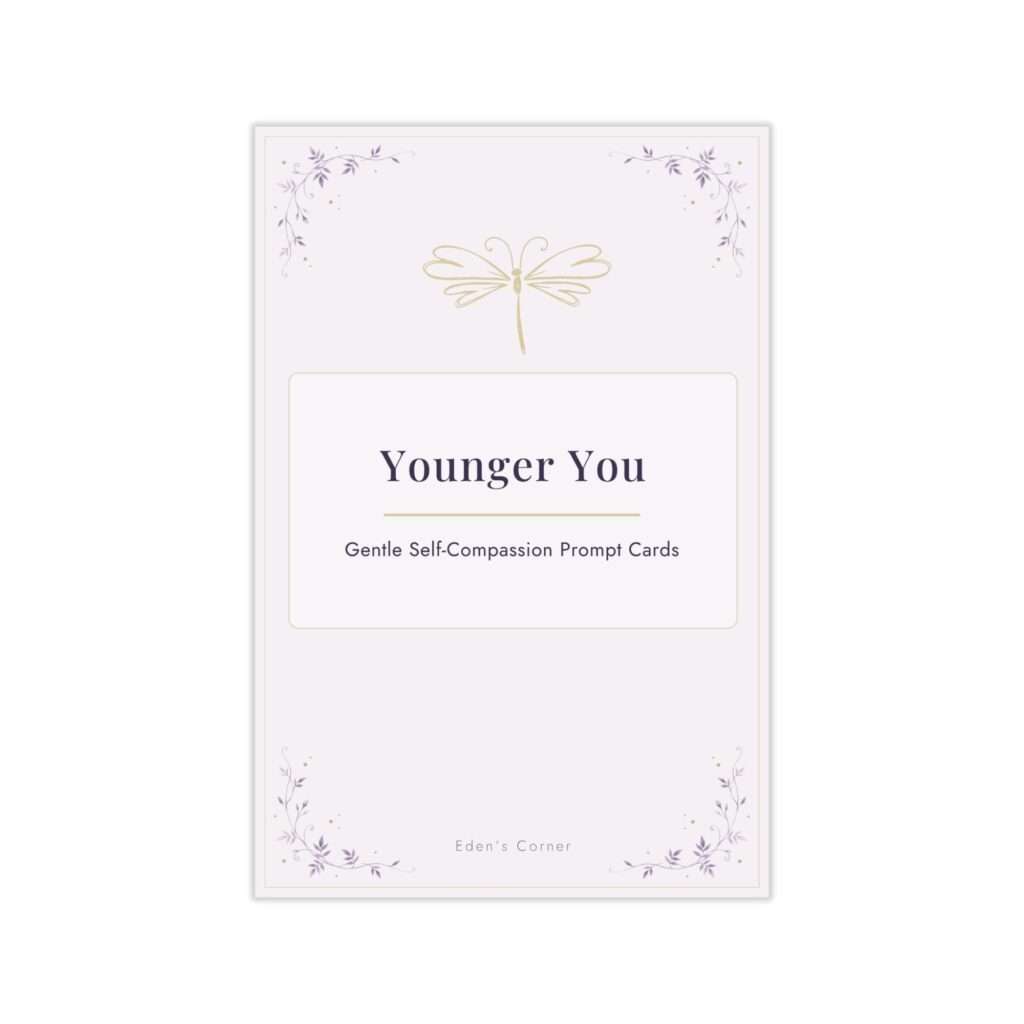 Younger You self-compassion prompt cards cover featuring a delicate gold dragonfly line illustration with purple floral corner accents, subtitled "Gentle Self-Compassion Prompt Cards."