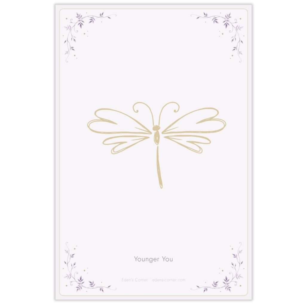 Younger You card back design featuring a gold dragonfly line illustration with purple floral corner accents